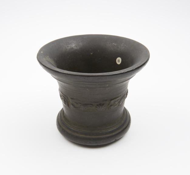 Bronze mortar with flared rim, moulded foot ring