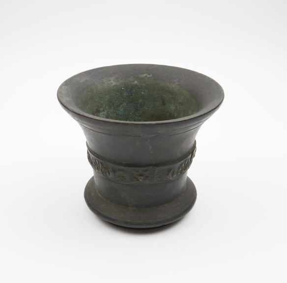 Bell shaped mortar, flared rim, moulded foot ring