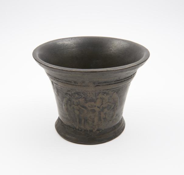 Bronze bell shaped mortar, flared rim, slightly flared foot