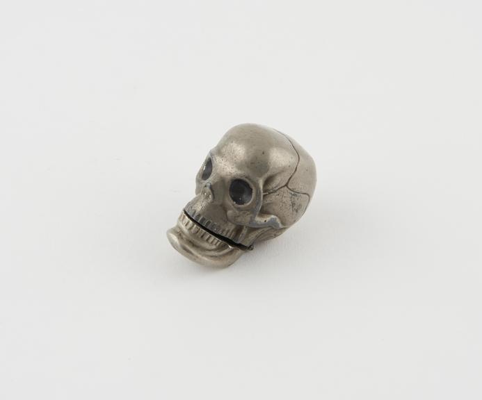 Match holder in form of a skull, silver(?) plated