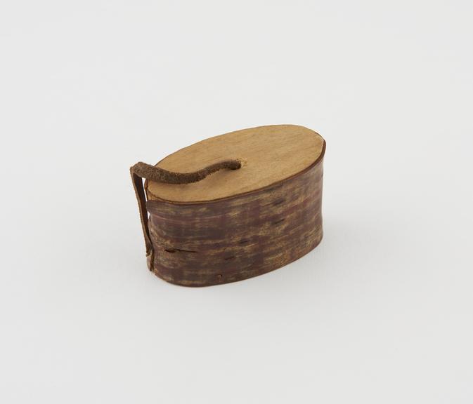 Oval cherrywood match container, shaped like billet of wood