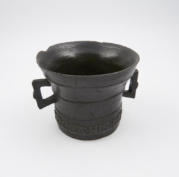 Bell-shaped bronze mortar, flared rim, flat base