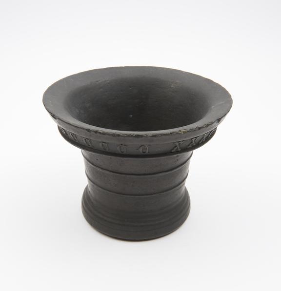 Small bronze bell-shaped mortar, thick everted rim