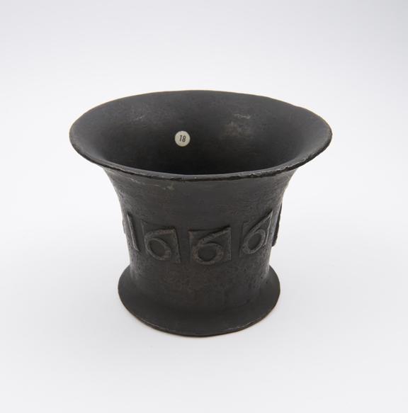 Bronze bell-shaped mortar, flaring flat base, plain flaring rim