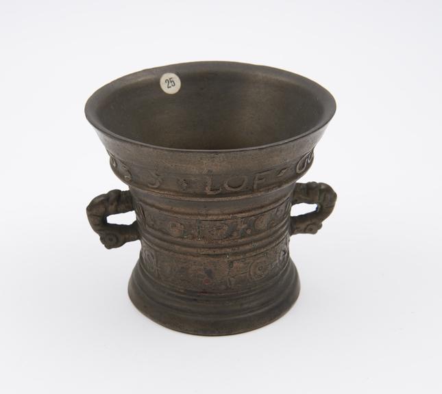 Tiny bell-shaped mortar, bronze, everted rim