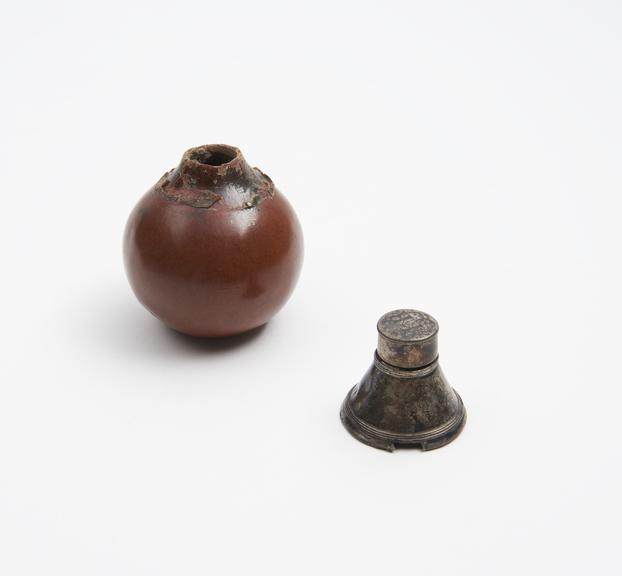 Possibly a spice box, made from a gourd, silver mounted top, I