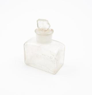 Clear glass bottle for Godfrey's Inhaler