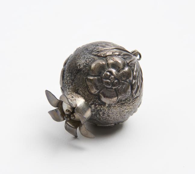 Silver pomander, spherical, embossed with flowers