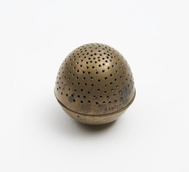 Brass pomander, ovoid, perforated, unscrews