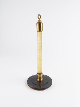 Glass rod with brass fittings