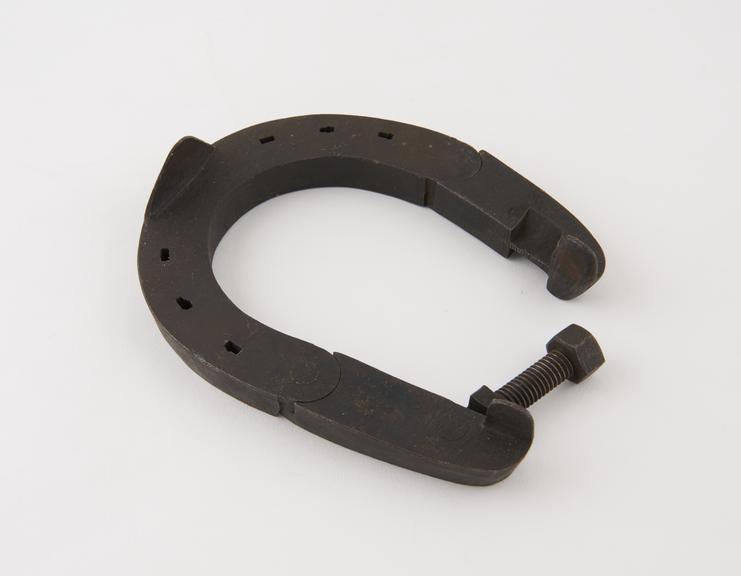 Horse shoe, jointed, iron, by Arnold and Sons of London