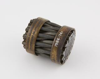 Sample of 1865 transatlantic cable (shore end) with end rings