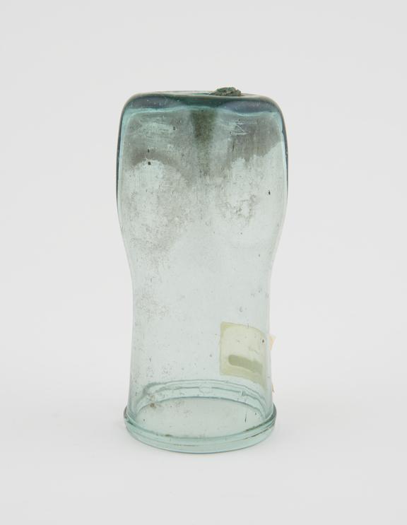 Glass jar, rectangular base, circular top