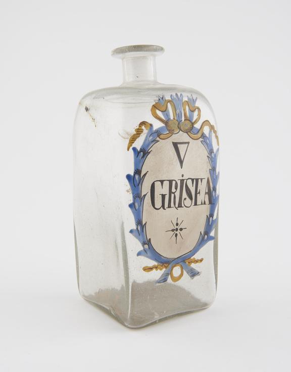 Glass bottle with painted inscription