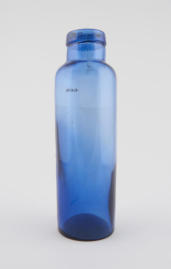 Tall blue glass bottle, machine maulded, probably English