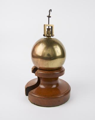 Foucault pendulum bob on stand