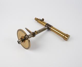 Brass Theodolite mounted onto a shaft with a brass disc