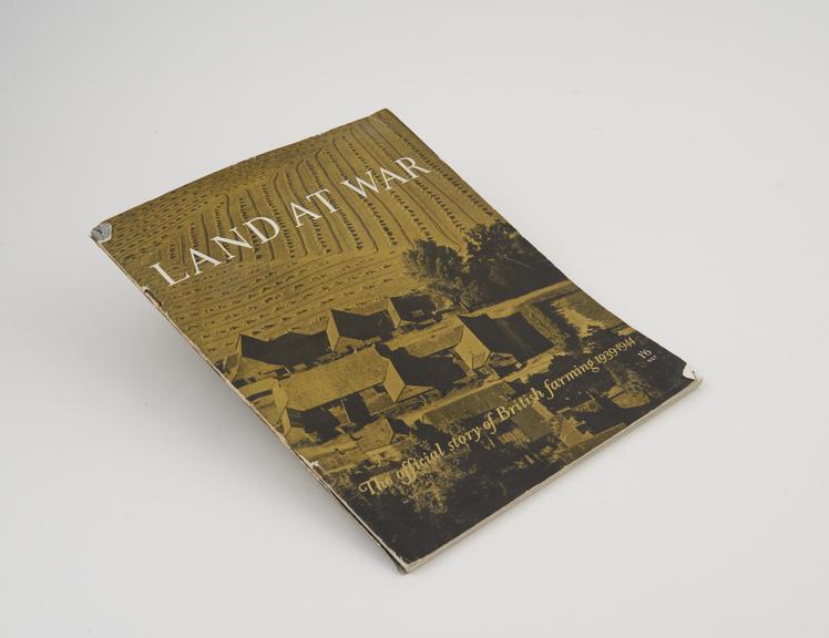 Paperback book titled 'Land at War: The official story of