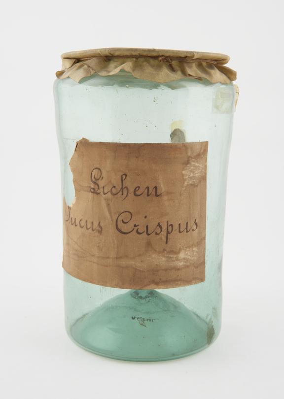 Glass drug jar, cylindrical, with parchment cover