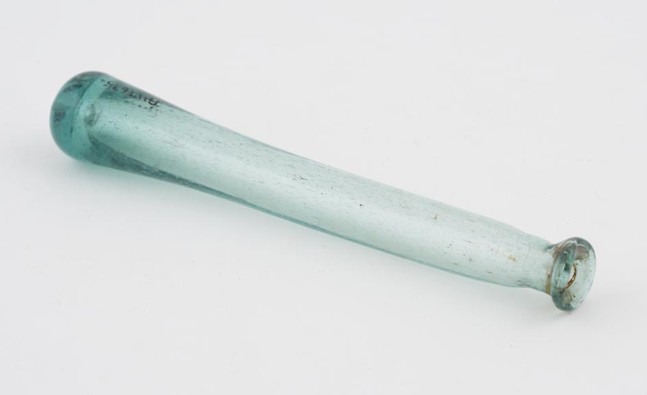 Green glass phial, cylindrical, elongated body, irregular form