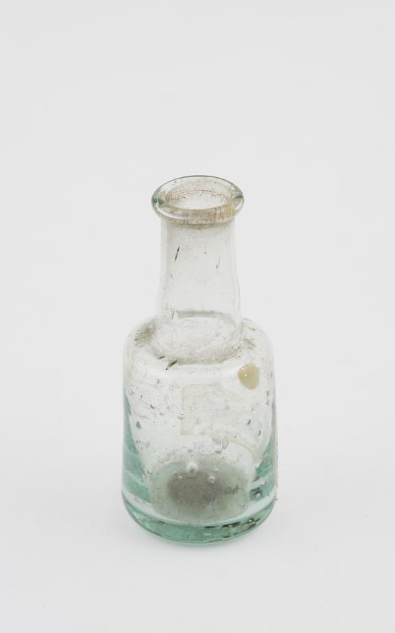 Glass bottle, small cylindrical body with long neck