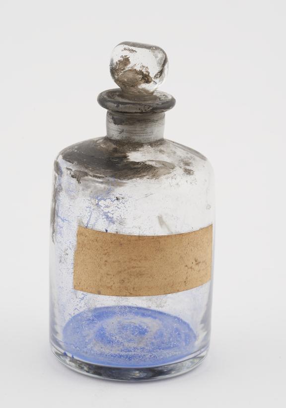 Bottle, shop round, clear glass, used for unidentified drug
