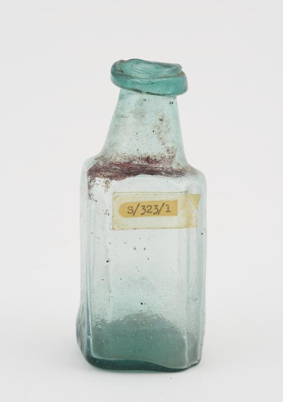 Glass bottle, possibly pharmaceutical