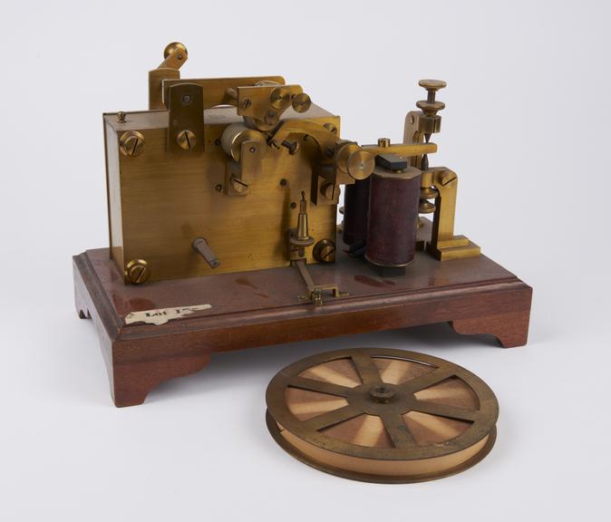 14. Embossing telegraph receiver, with reel of paper tape