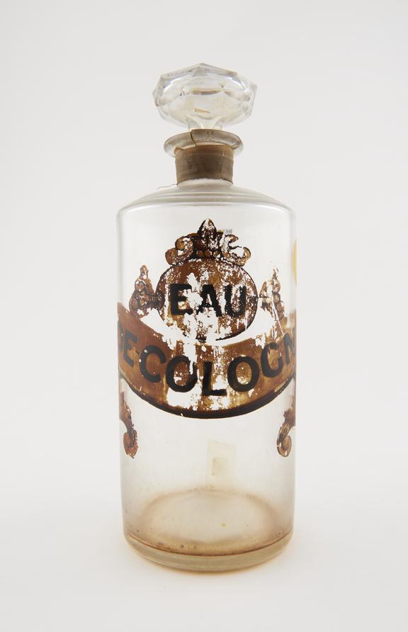 Bottle, clear glass, trace contents, for eau de cologne