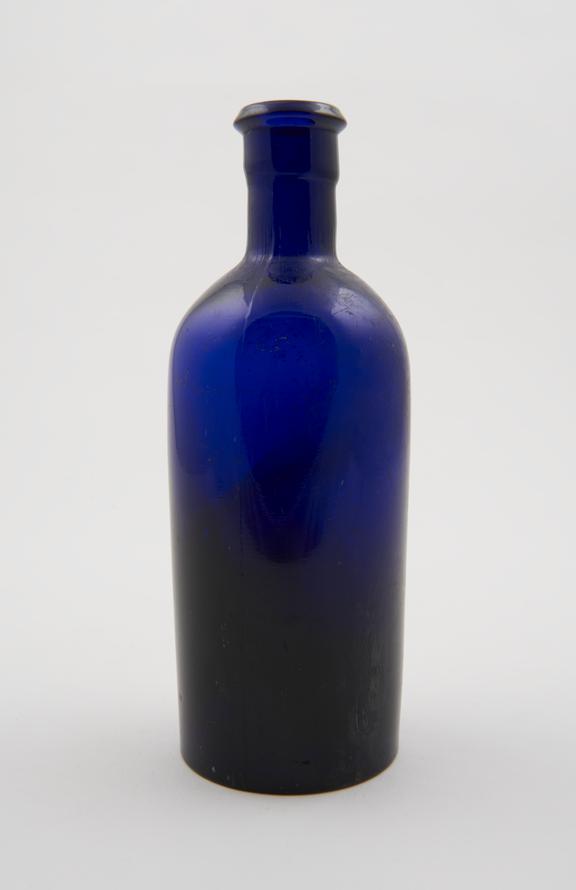 Moulded blue glass bottle, with stopper