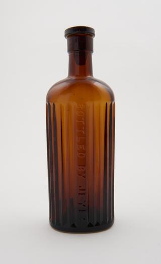 Brown glass ridged bottle, by Jeyes