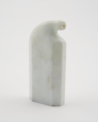 Opaque white glass bottle with spout