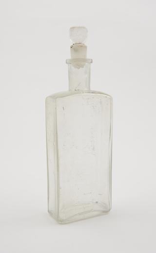 Clear glass bottle, H.P. Truefitt Ltd.
