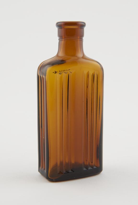 Brown glass rectangular bottle with tall neck