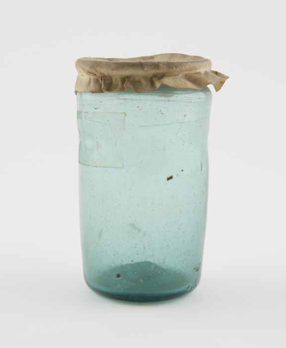 Glass drug jar, with parchment cover, possibly Spanish
