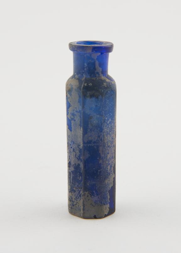 Dark blue octagonal bottle, glass, probably European, 1850-1920