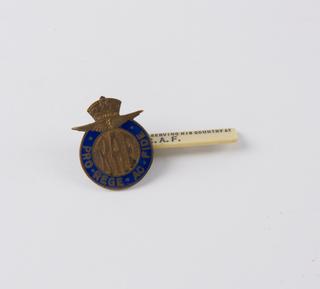 Badge, metal, circular, inscribed: 'RAF', worn by a Royal Aircraft Factory person