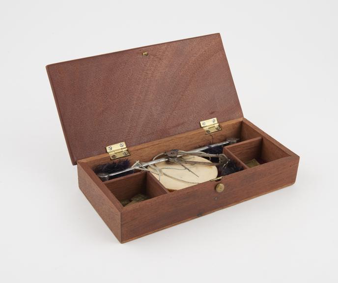 Apothcary's balance with steal beam and ivory pans in rectangular wooden box