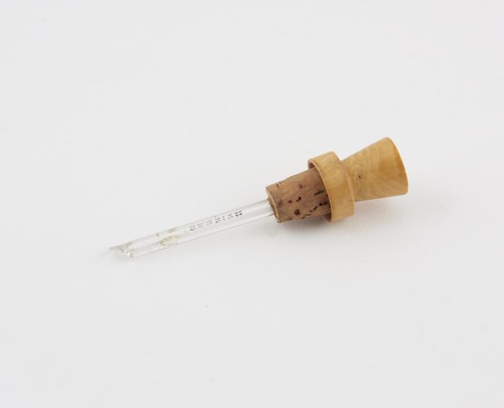 Stopper from dropper bottle, with applicatpr, cork