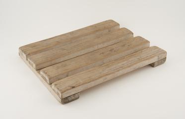 Slatted duckboard used in a public bathhouse