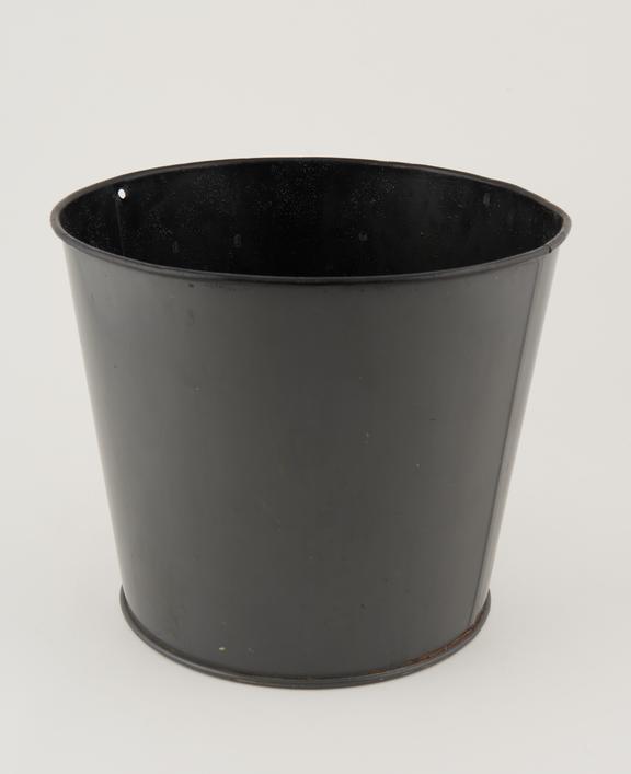 Grey-painted metal waste bin, 1972