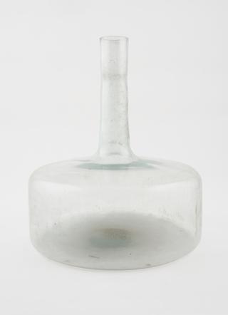 One of ten glass pharmacy bottles