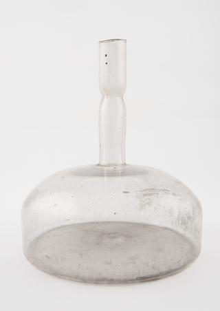 One of ten glass pharmacy bottles