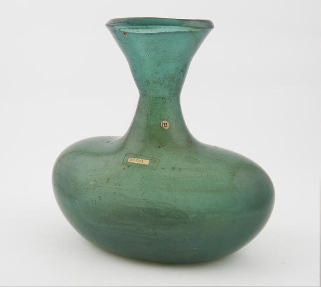 Bottle, with funnel shaped neck, possibly pharmaceutical