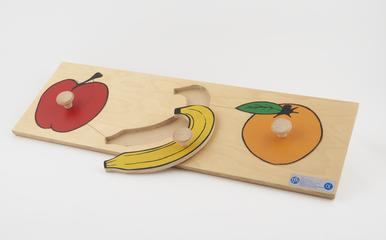 Wooden puzzle board showing fruit