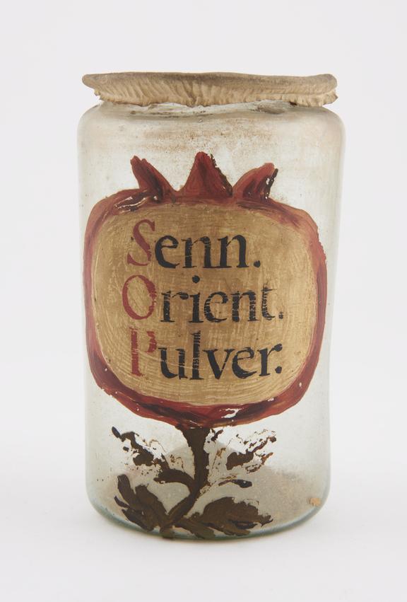 Glass drug jar, cylindrical, with parchment cover