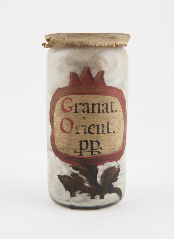 Glass drug jar, cylindrical, with parchment cover