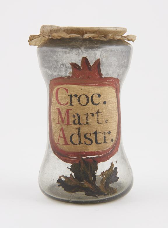 Glass albarello, with vellum cover, labelled Croc.Mart.Adstr