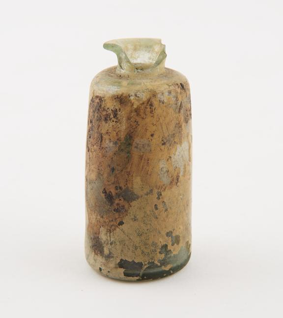 Cylindricla iridescent green glass bottle
