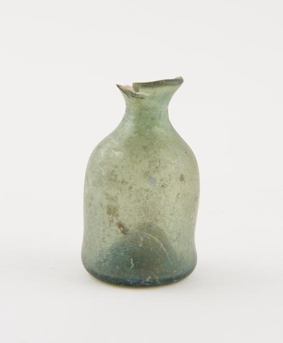 Iridescent glass bottle, green, cylindrical, bell-shaped